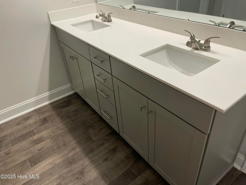 Furnished interior view inside a new home in Mill Creek Cove, Bolivia (Image 6).