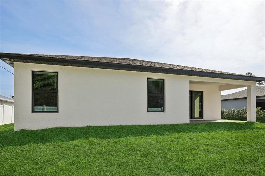 Exterior details and patio area of a home in , Port Charlotte (Image 28).