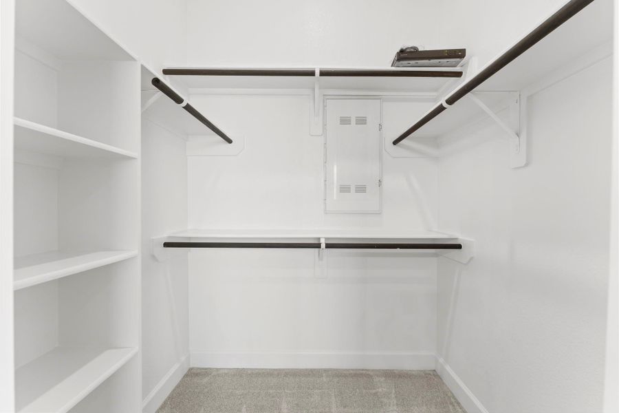 Separate closets in the primary bedroom keep everything beautifully organized and within reach. Separate closets in the primary bedroom keep everything beautifully organized and within reach.