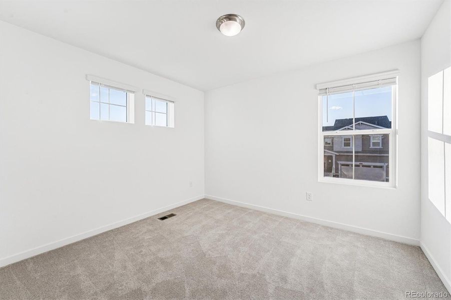 Spacious, unfurnished interior of a new home in Parkdale: Paired Homes, Erie (Image 27).