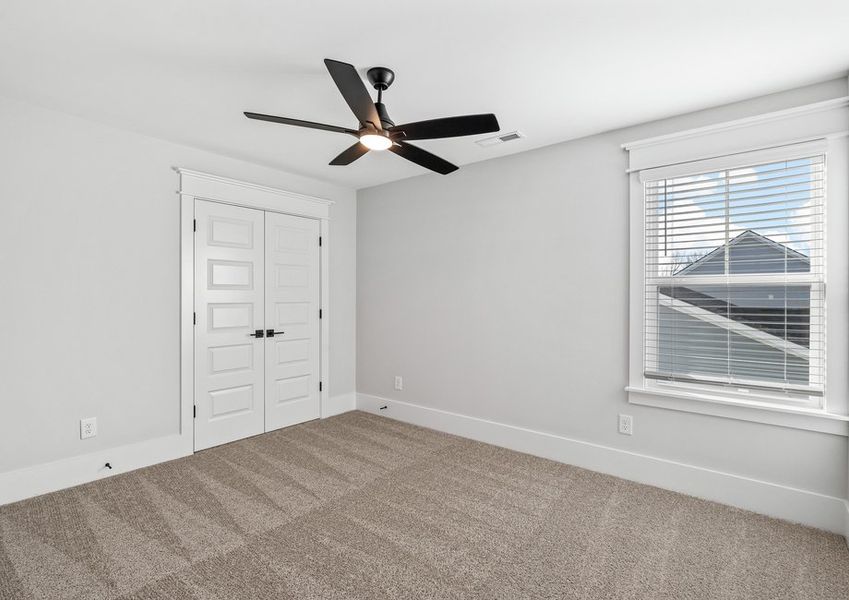 Spacious secondary bedrooms are located throughout the entire home.