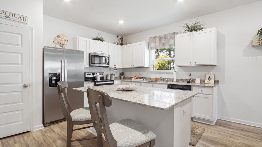 Representative furnished interior of a home built from the Bayberry by D.R. Horton in Owl's Head East, Freeport (Image 9). Representative furnished interior of a home built from the Bayberry by D.R. Horton in Owl's Head East, Freeport (Image 9).
