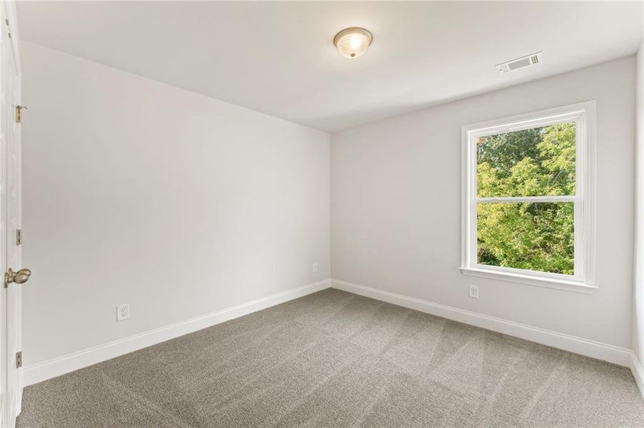 Spacious, unfurnished interior of a new home in Clark Farms, Flowery Branch (Image 19).