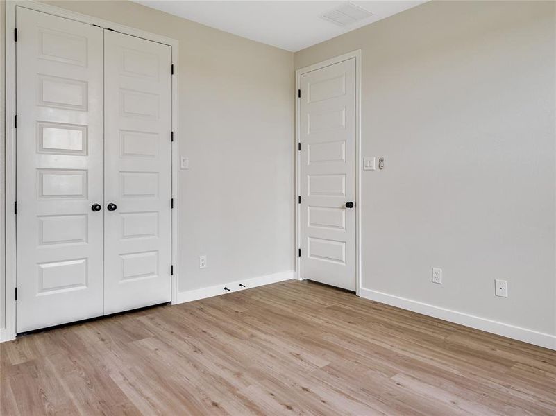 One of the spacious bedrooms