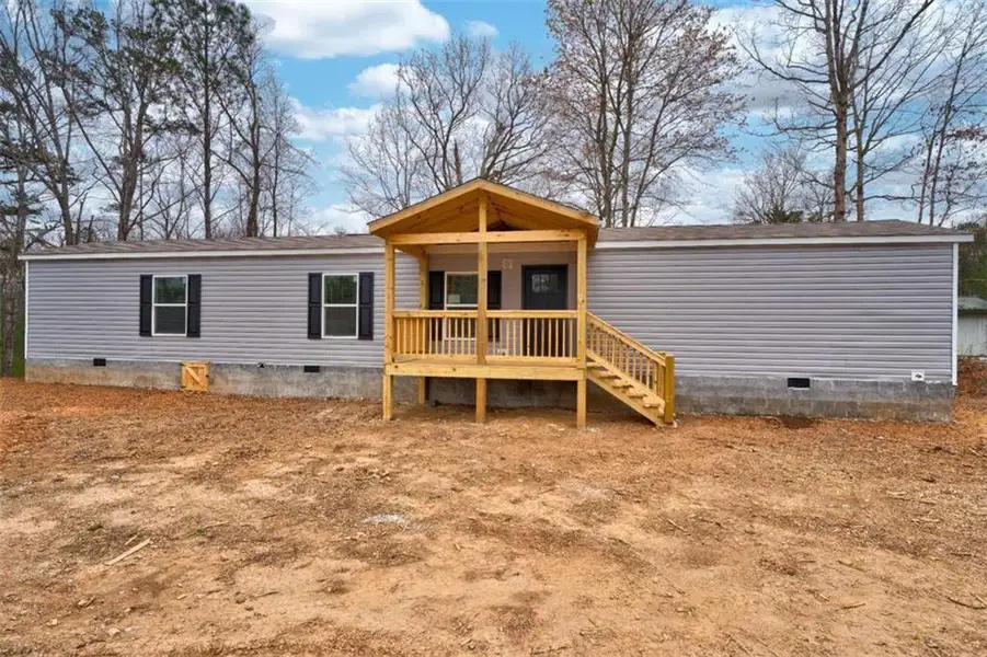 Exterior details and patio area of a home in , Ellijay (Image 14).