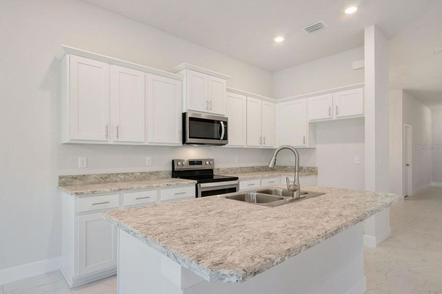 Furnished interior view inside a new home in Ocala Crossings South, Ocala (Image 5).