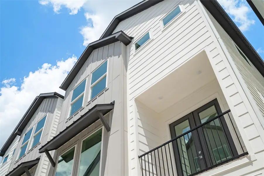 Exterior details and patio area of a home in , Houston (Image 4).