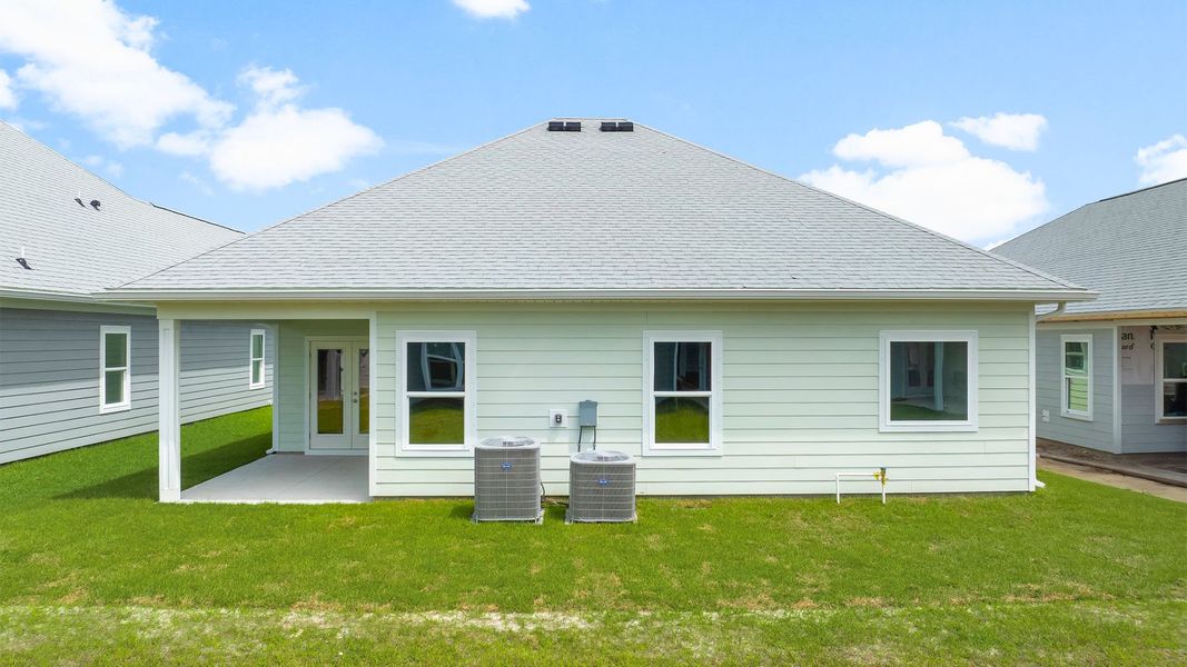 Exterior details and patio area of a home in WindMark Beach, Port Saint Joe (Image 4).