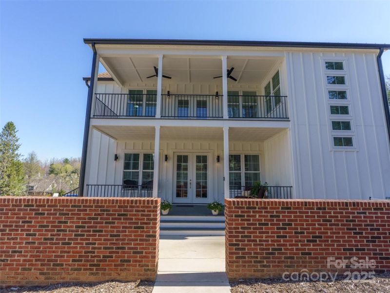 Front exterior of a new home in , Saluda, NC, highlighting curb appeal (Image 18).