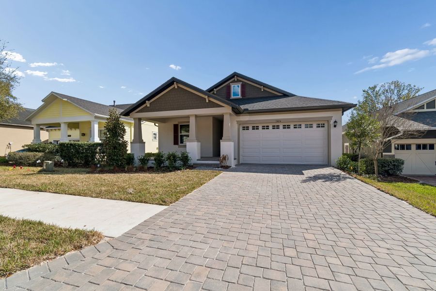 Representative exterior photo of a completed home built from the Juno by William Ryan Homes in Southern Hills Plantation, Brooksville, FL (Image 25). Representative exterior photo of a completed home built from the Juno by William Ryan Homes in Southern Hills Plantation, Brooksville, FL (Image 25).