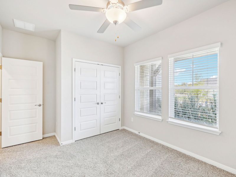 Spacious, unfurnished interior of a new home in Riverbend at Double Eagle - Boulevard Collection, Cedar Creek (Image 11).