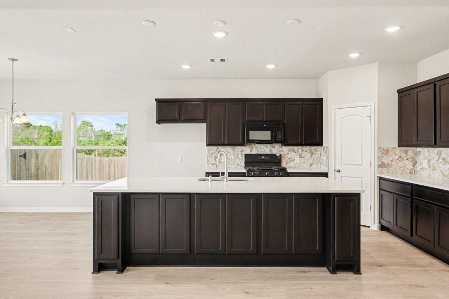 Furnished interior view inside a new home in Clear View Estates, Willis (Image 9).