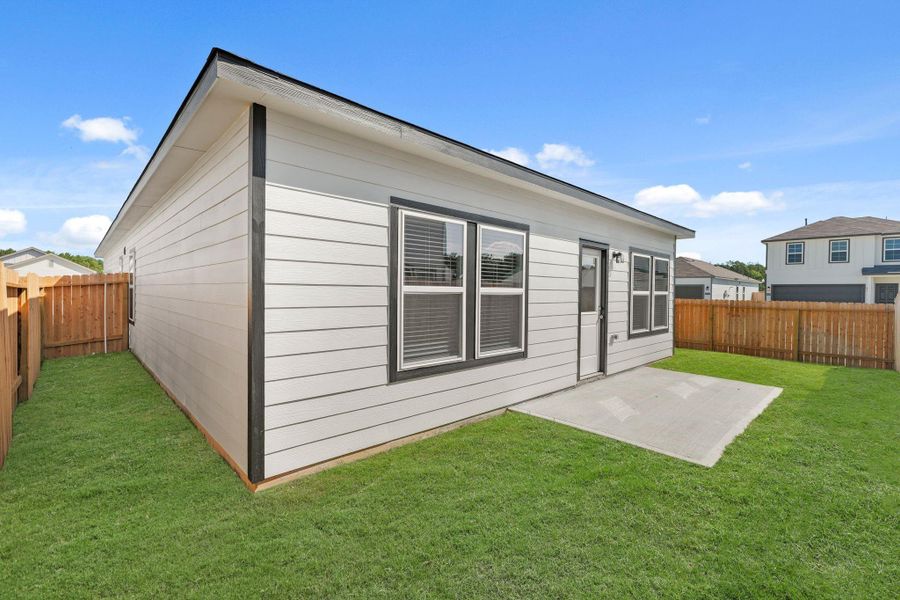 Exterior details and patio area of a home in Northpark South, Porter (Image 3). Exterior details and patio area of a home in Northpark South, Porter (Image 3).