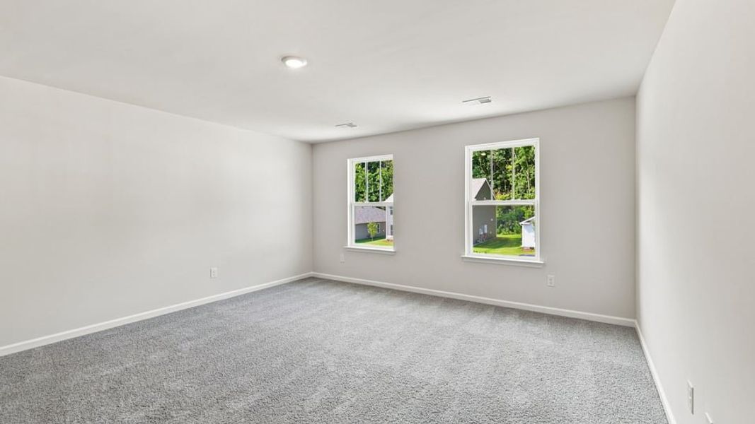 Spacious, unfurnished interior of a new home in Bentley Park, Greenwood (Image 29).