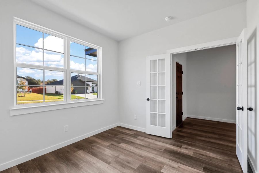 Representative unfurnished interior of a home built from the Garrison II by Cheldan Homes in Stoneview, Glen Rose (Image 75).