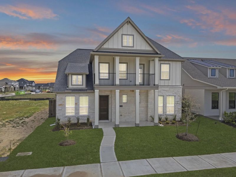 Representative exterior photo of a completed home built from the Sorenstam by Chesmar Homes in Riceland Alley Loads, Mont Belvieu, TX (Image 27).