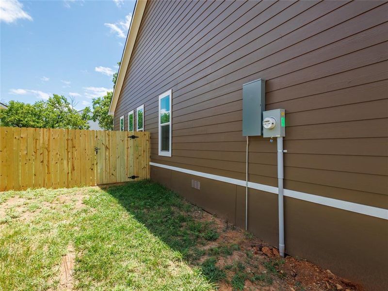 Exterior details and patio area of a home in , Brownwood (Image 17).