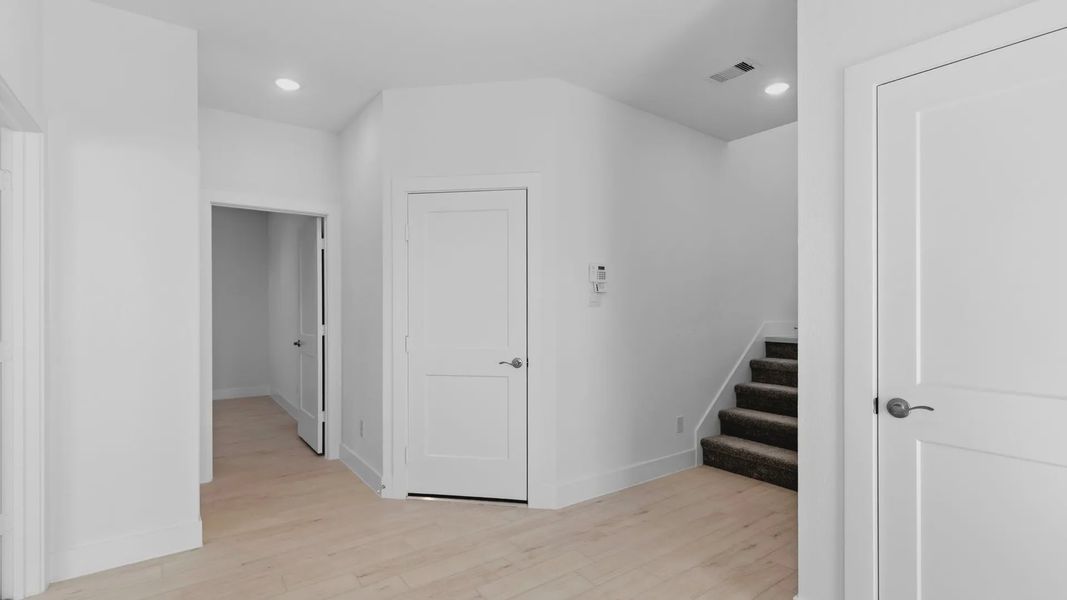 Representative unfurnished interior of a home built from the Oakdale by Chesmar Homes in Bridgeland Courtyard, Cypress (Image 24).
