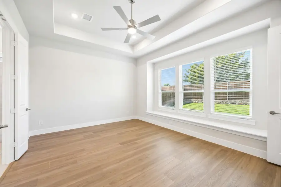 Spacious, unfurnished interior of a new home in Rainwater Crossing, Celina (Image 22).