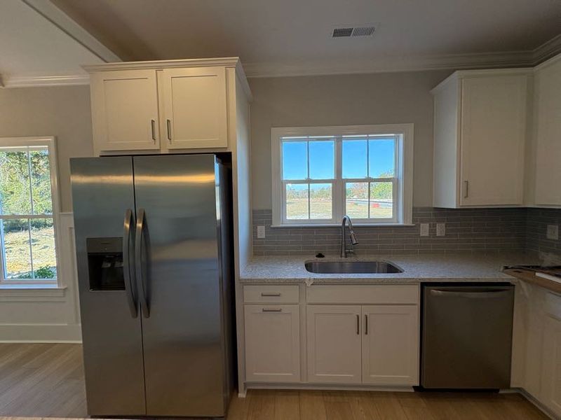 Furnished interior view inside a new home in Riverside Cove, Wilmington (Image 11).