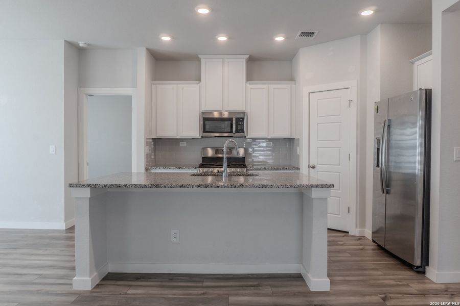 Furnished interior view inside a new home in The Meadows at Hunters Ranch, San Antonio (Image 9). Furnished interior view inside a new home in The Meadows at Hunters Ranch, San Antonio (Image 9).