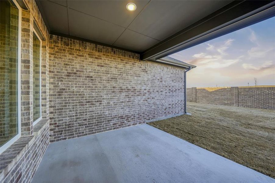 Exterior details and patio area of a home in Morningstar, Aledo (Image 23).