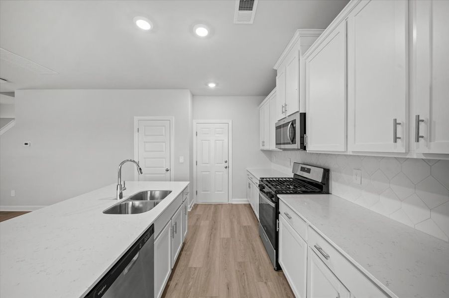 Furnished interior view inside a new home in The Farm at Wells Creek - Heritage Collection, Gray Court (Image 6).