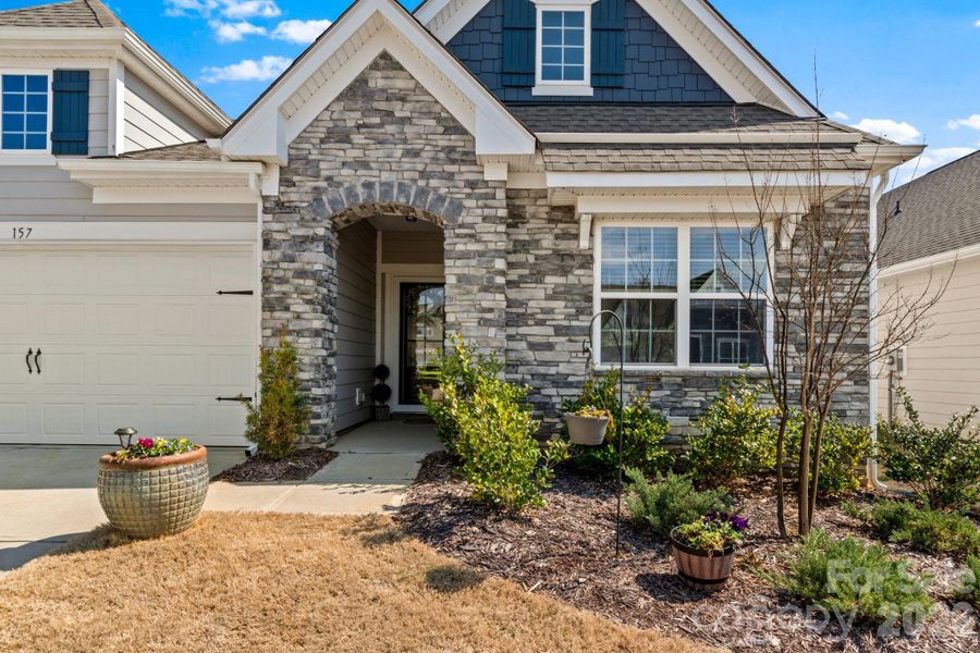 Front exterior of a new home in Bell Farm, Statesville, NC, highlighting curb appeal (Image 25).