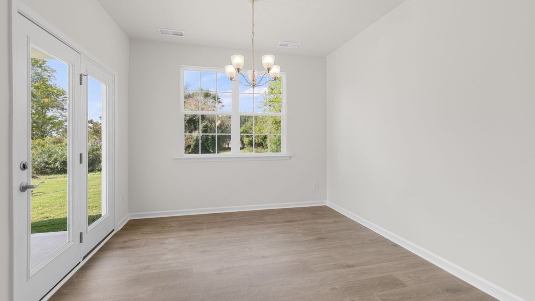 Spacious, unfurnished interior of a new home in The Villas at Kinsley, Jamestown (Image 18).