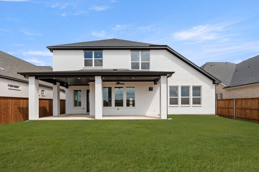 Representative exterior photo of a completed home built from the Aspen by Stonefield Homes in Rio Vista at Kelly Ranch, Aledo, TX (Image 24).