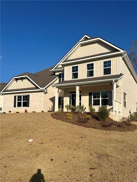 Exterior details and patio area of a home in Mirror Lake at South Harbour, Villa Rica (Image 21).