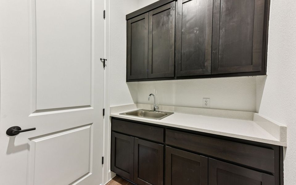 Furnished interior view inside a new home in Kissing Tree, San Marcos (Image 7).