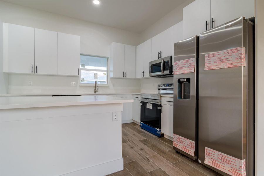 Furnished interior view inside a new home in , Port Charlotte (Image 9). Furnished interior view inside a new home in , Port Charlotte (Image 9).