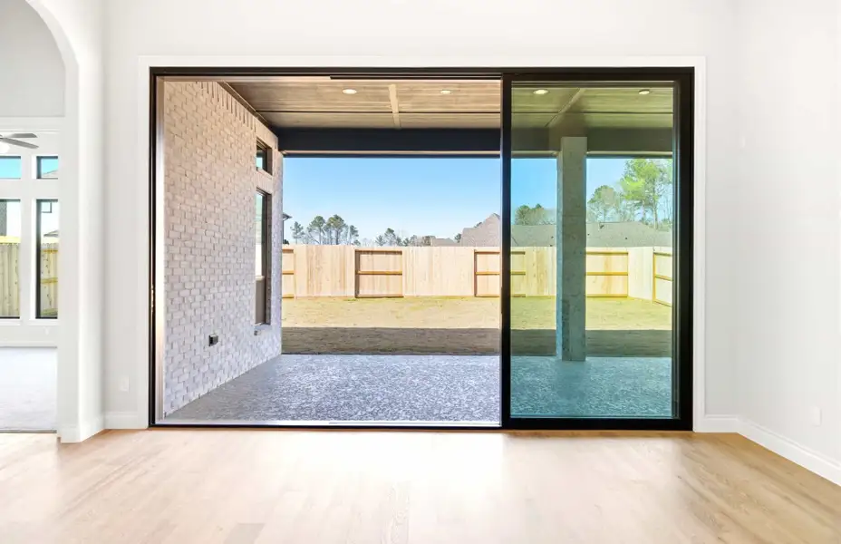 Exterior details and patio area of a home in The Highlands 55′, Porter (Image 3).