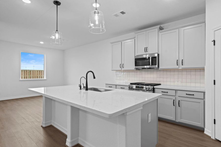This kitchen is not only a functional space but also has ample storage. Whether you're a seasoned chef or just love to gather and enjoy good food, this kitchen is a dream come true.