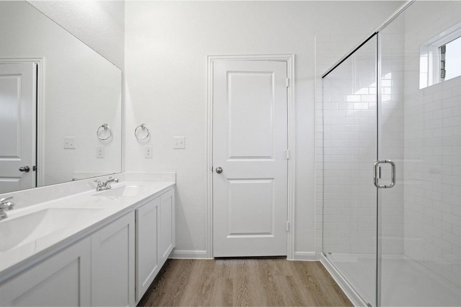 Furnished interior view inside a new home in The Canopies, Splendora (Image 7).