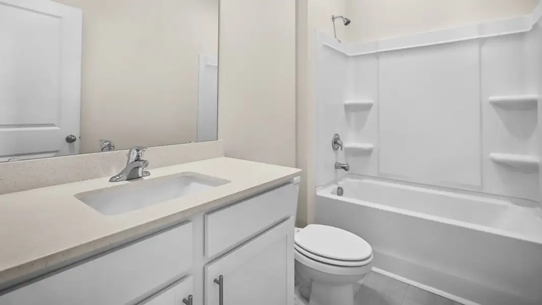 Furnished interior view inside a new home in The Townes at Madden West, Fuquay Varina (Image 6).