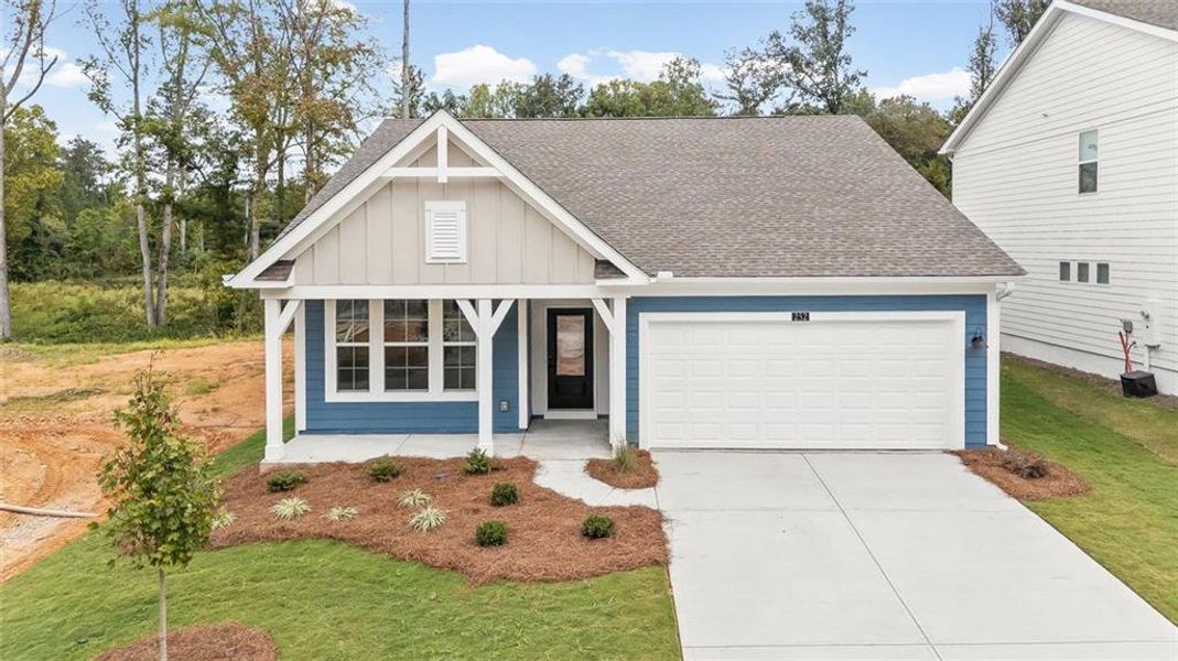 Front exterior of a new home in Sage Woods, Dallas, GA, highlighting curb appeal (Image 19).