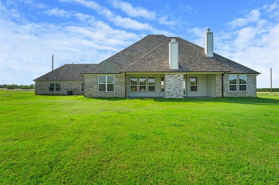 Exterior details and patio area of a home in , Corsicana (Image 24). Exterior details and patio area of a home in , Corsicana (Image 24).