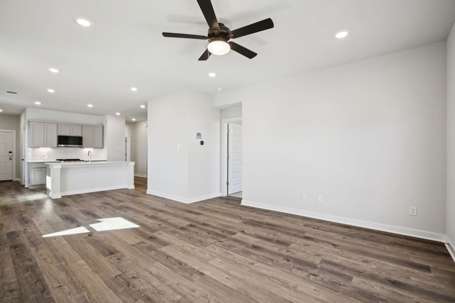 A large empty living room. A large empty living room.