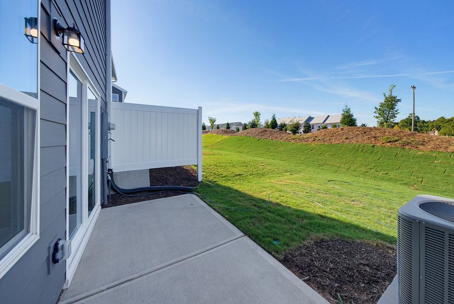 Exterior details and patio area of a home in Sweetbrier, Durham (Image 4).