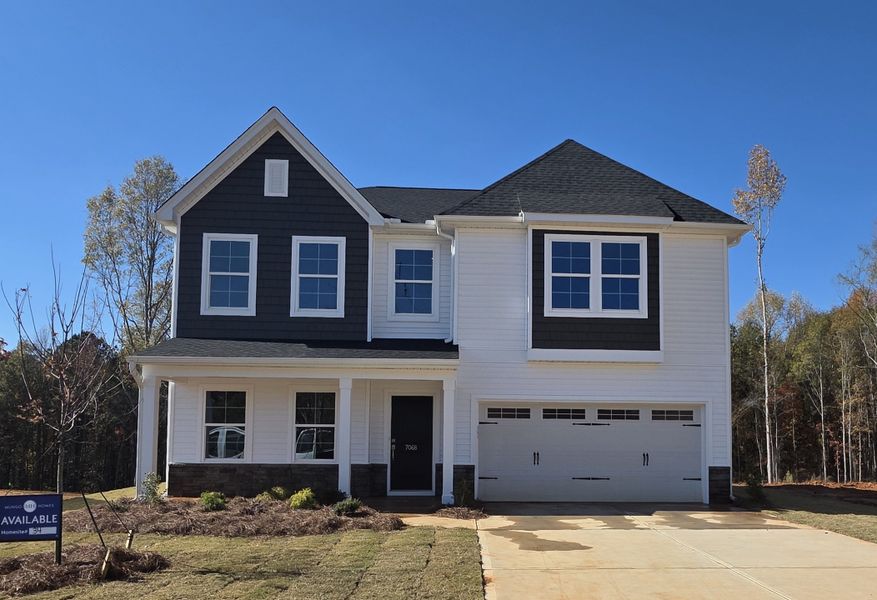 Front exterior of a new home in Fairview Falls, Chesnee, SC, highlighting curb appeal (Image 1). Front exterior of a new home in Fairview Falls, Chesnee, SC, highlighting curb appeal (Image 1).