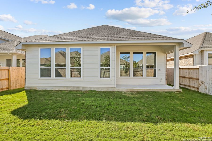 Exterior details and patio area of a home in Stillwater Ranch 45', San Antonio (Image 22).
