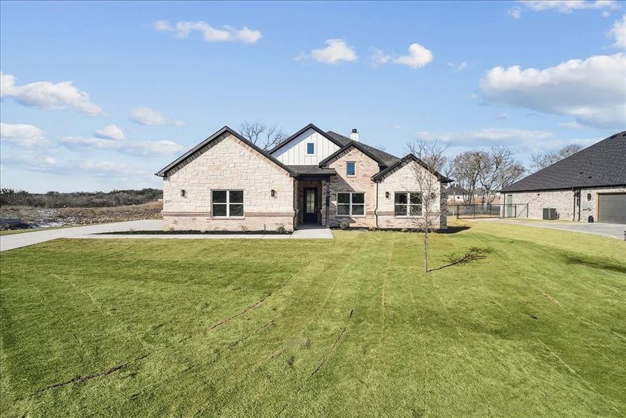 Front exterior of a new home in , Azle, TX, highlighting curb appeal (Image 26). Front exterior of a new home in , Azle, TX, highlighting curb appeal (Image 26).