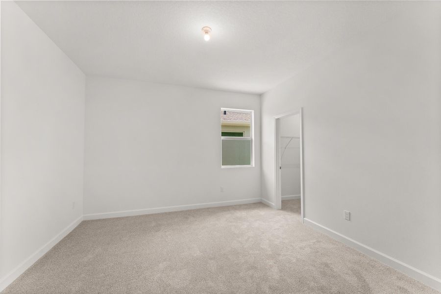 Spacious, unfurnished interior of a new home in Tradition - Cadence, Port St. Lucie (Image 8).