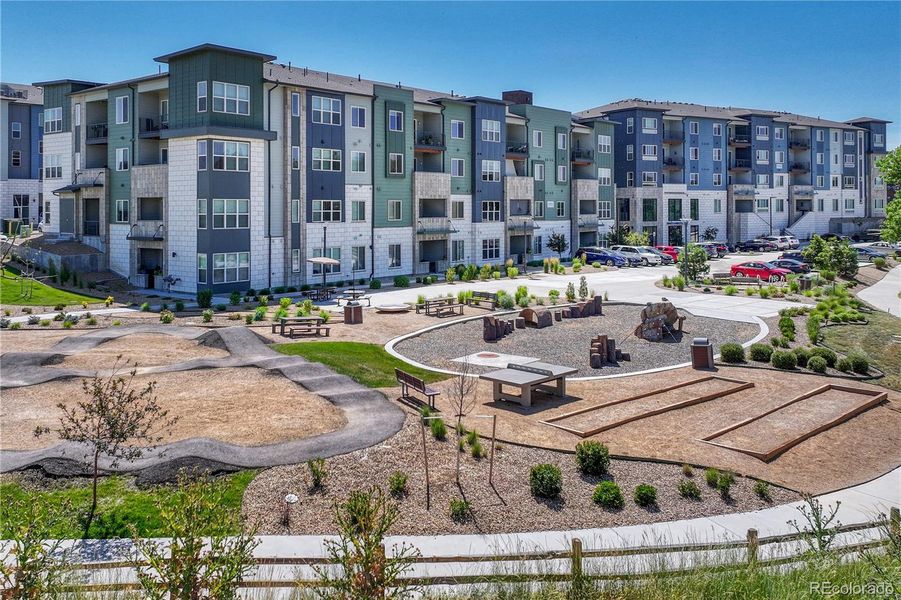 Front exterior of a new home in The Trails at Westcreek, Parker, CO, highlighting curb appeal (Image 26).