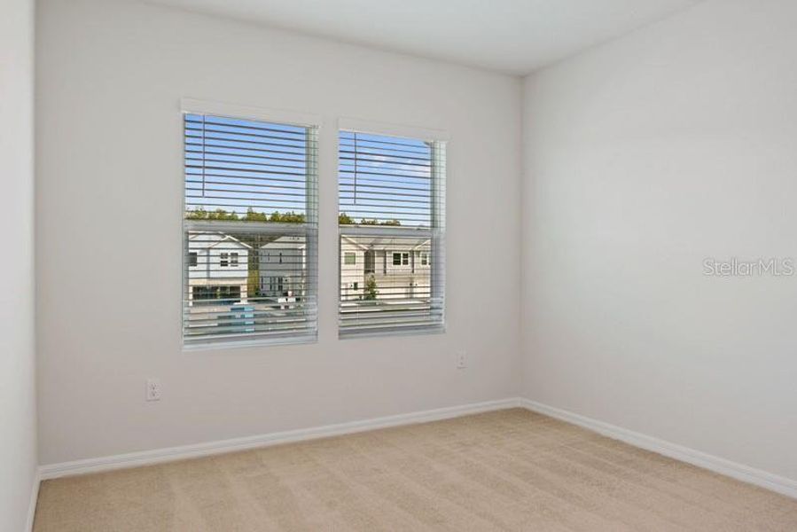 Bedroom Two **Photos are of a Similar Home