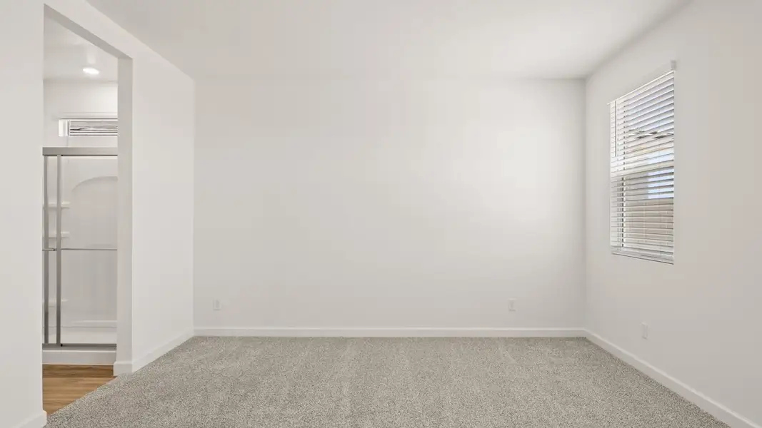 Spacious, unfurnished interior of a new home in Zanjero Pass, Waddell (Image 34).