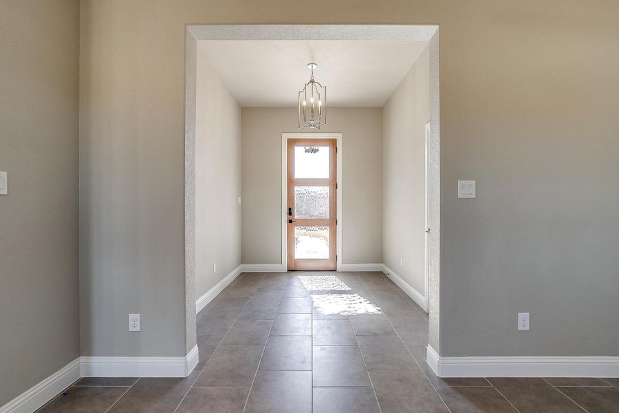 Representative unfurnished interior of a home built from the Augusta Court by Trinity Classic Homes in Zion Trails, Poolville (Image 29).