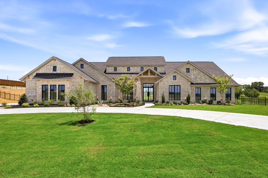 Front exterior of a new home in Fleming Pointe, Fort Worth, TX, highlighting curb appeal (Image 27).